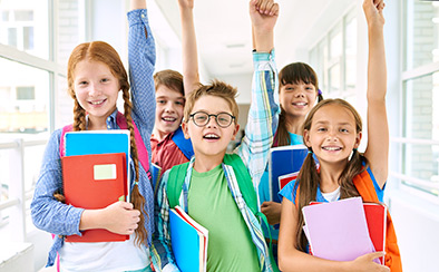 Children raising their hands